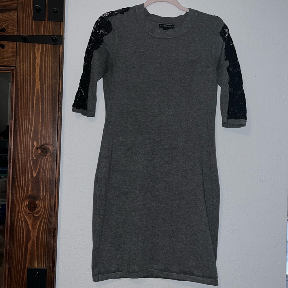 Gray Mini dress with black lace three-quarter inch sleeves.